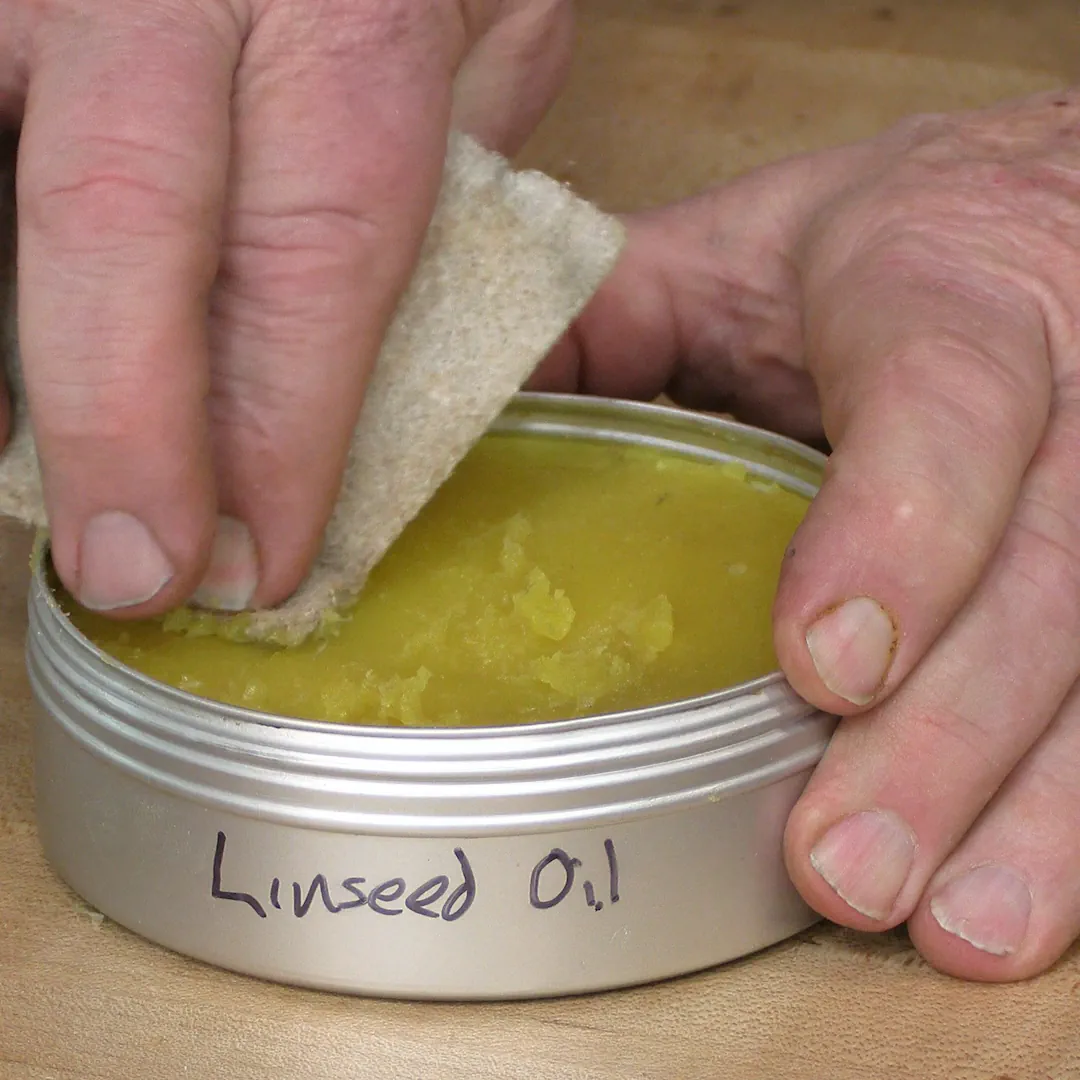 mashing linseed oil board butter to make it spreadable