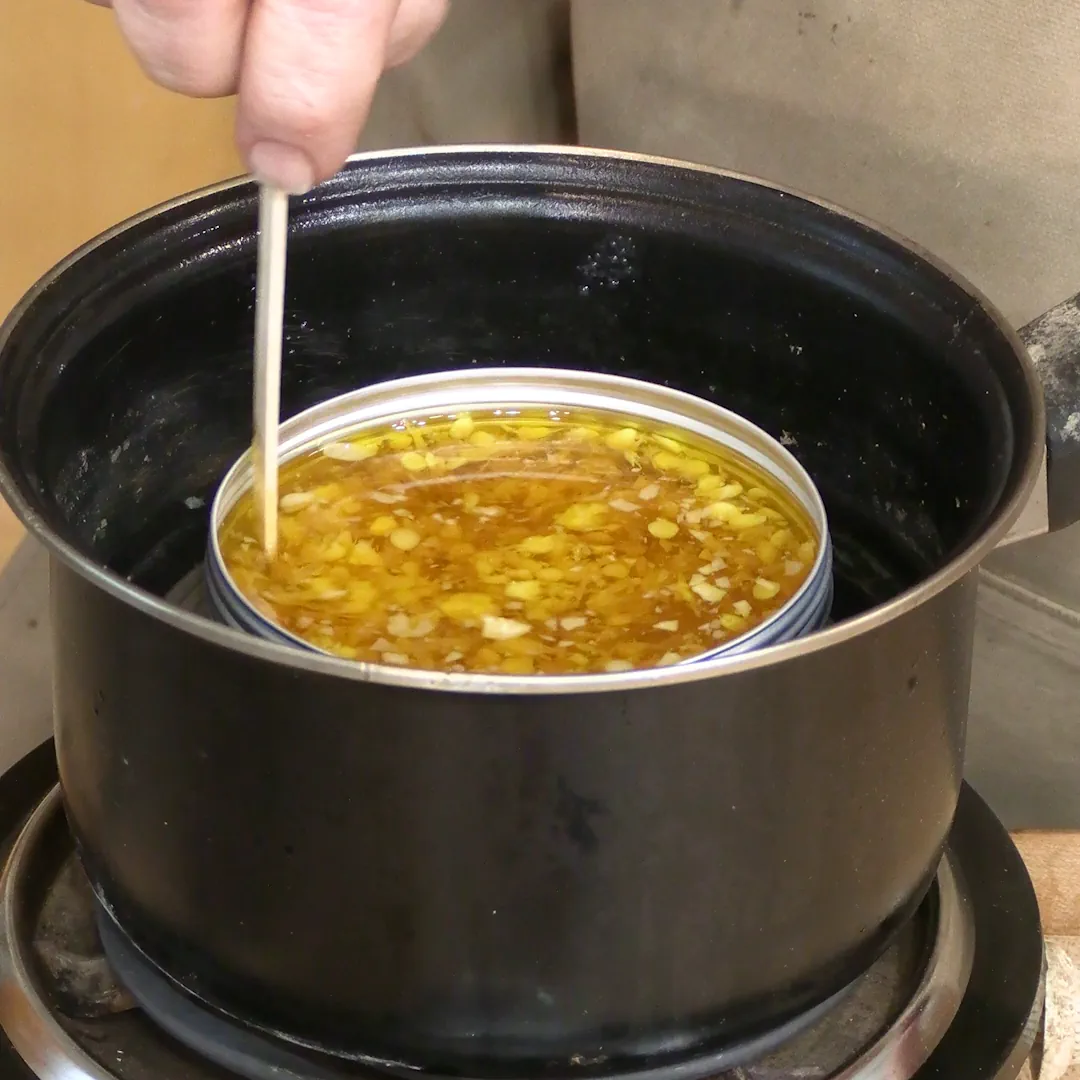 beeswax, linseed oil, carnuba wax, melting and mixing in a double boiler