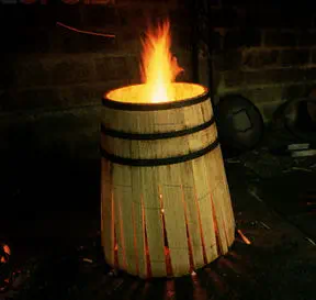 wood barrel on fire